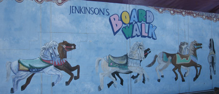 painting on a wall advertising the boardwalk